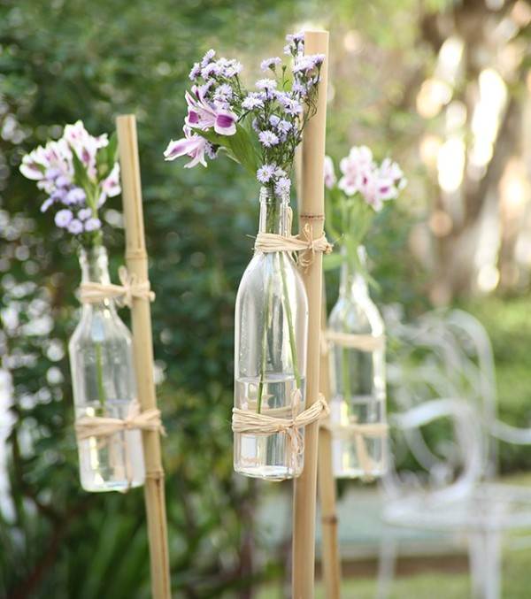 detalhe garrafa de vinho no bambu casamento