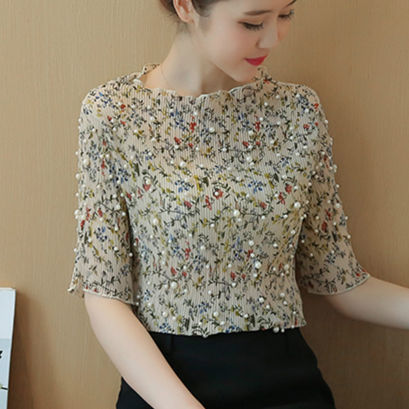 blusa decorada com perola