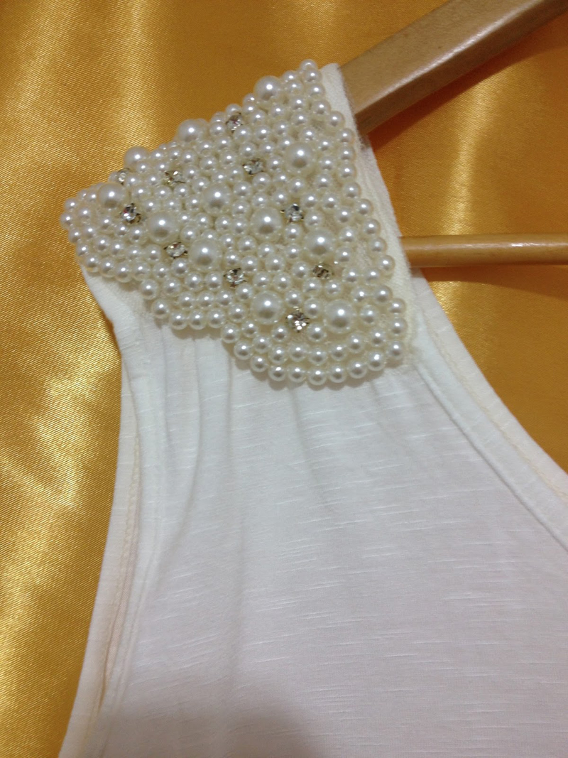 blusa decorada com perola