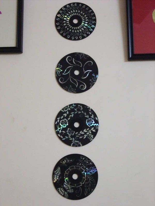 Artesanato com CD antigo na parede