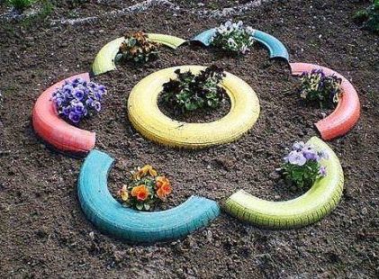 pneus pintados para jardim em flor