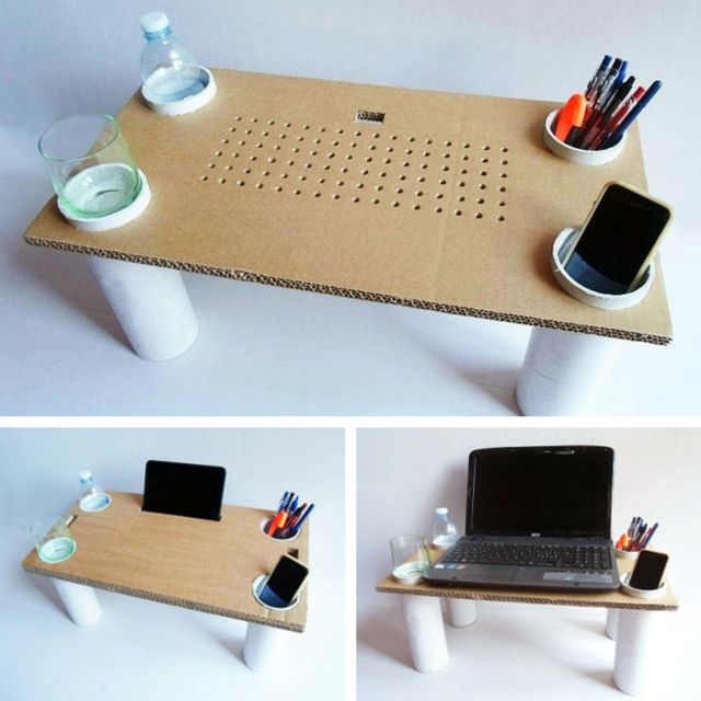 mesa com papelão notebook