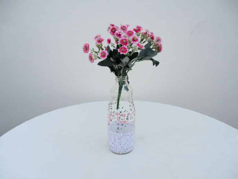 garrafa decorada com flores