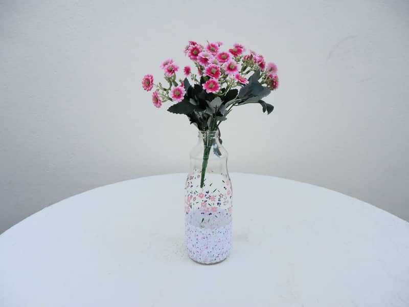 garrafa decorada com flores