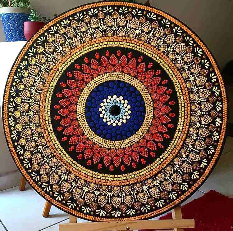 mandala pontilhismo olho grego