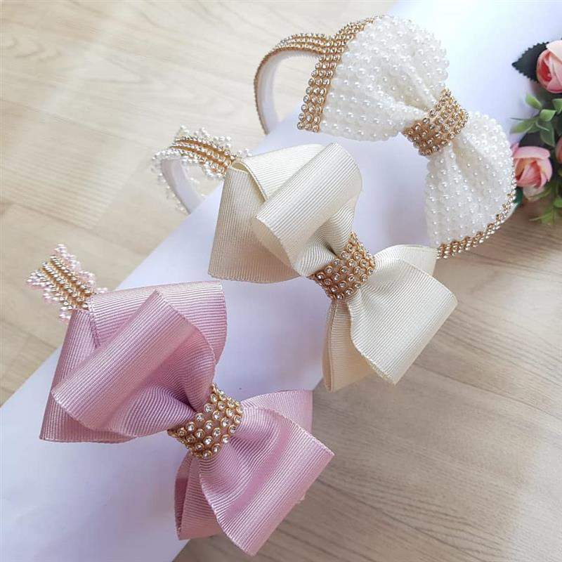 laços com strass e perolas
