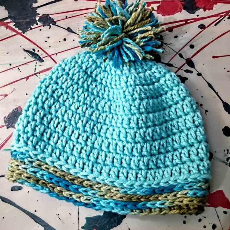 Gorro azul com pompom