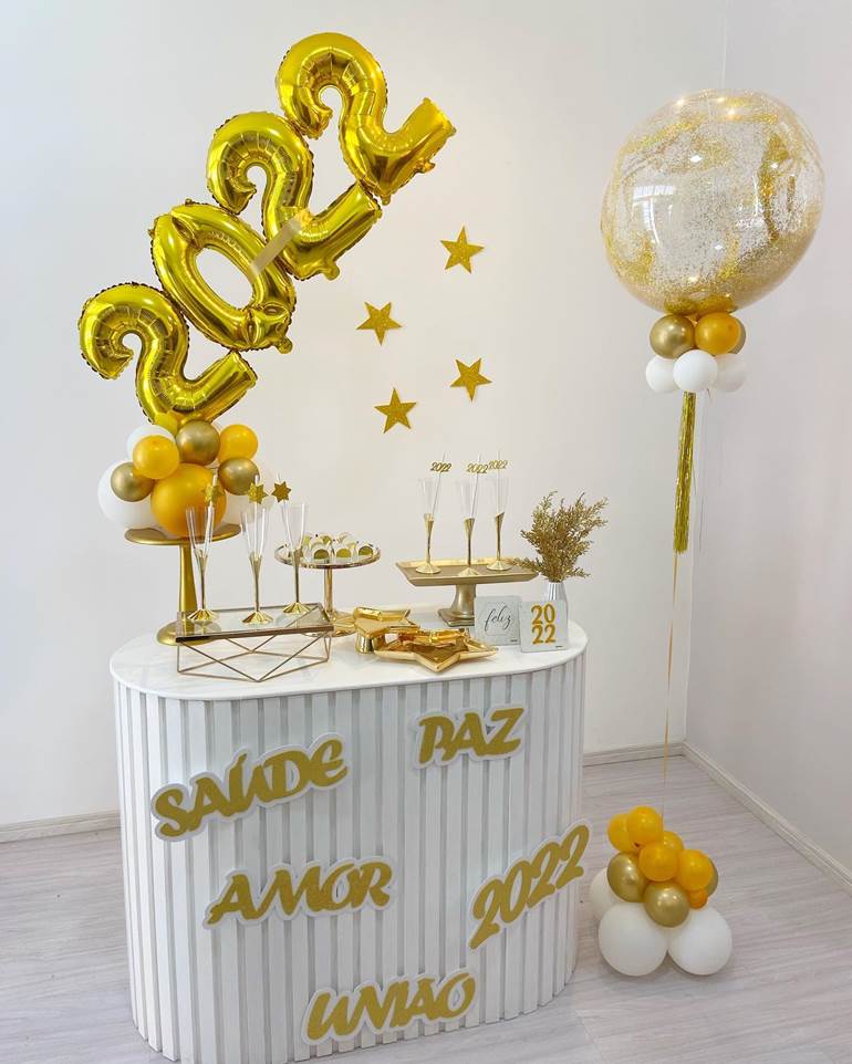 Golden new year decoration with stars and words