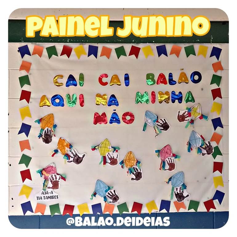 painel junino com mãos e balões