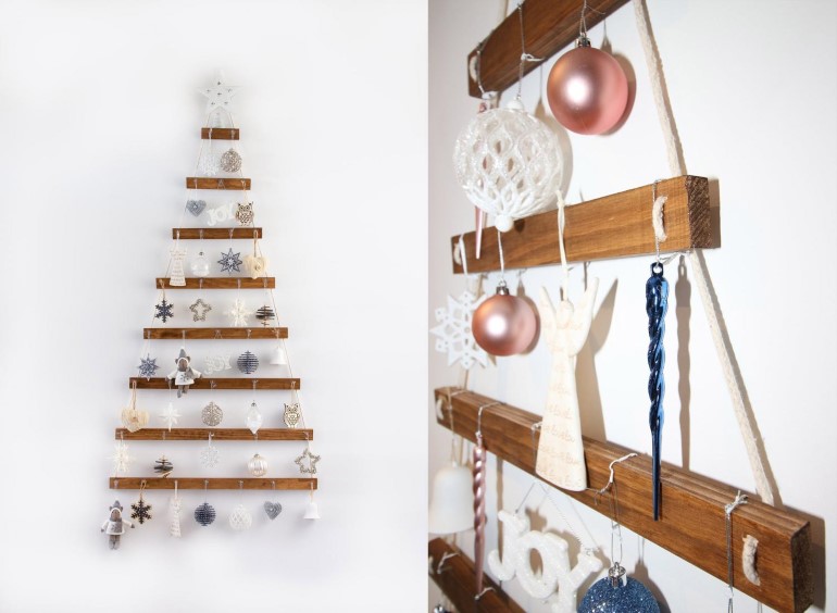 Árvore de Natal na parede com madeira